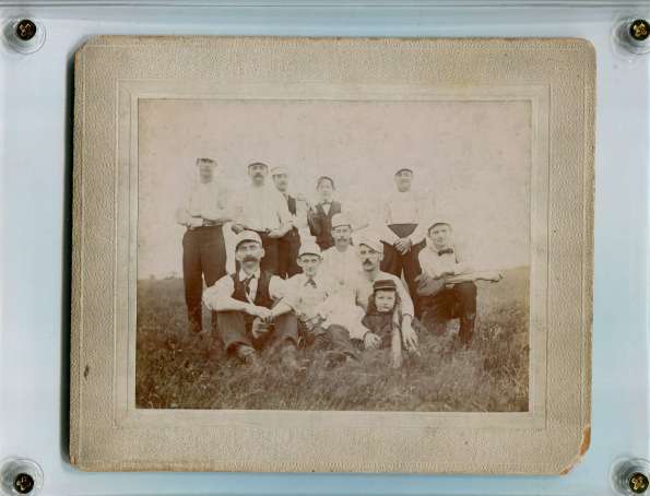 Early Base Ball Team in Grass with Child