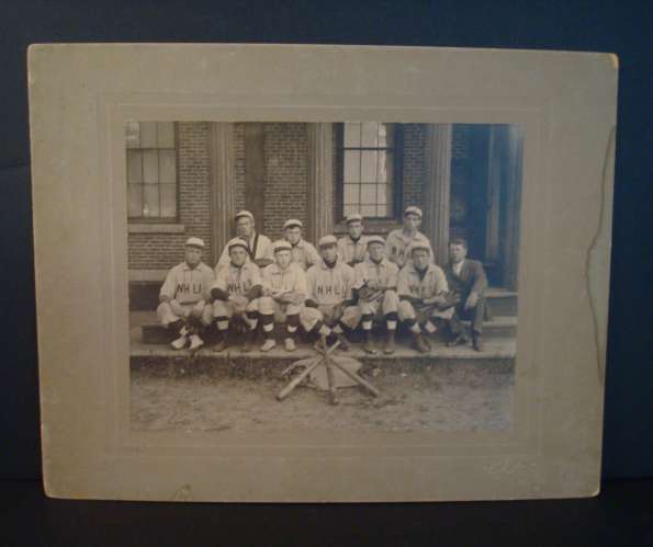 NHLI Base Ball Team in Front of Brick Building with Equipment 1908