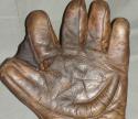 View the image: Early 1900's Spalding Crescent Glove Front