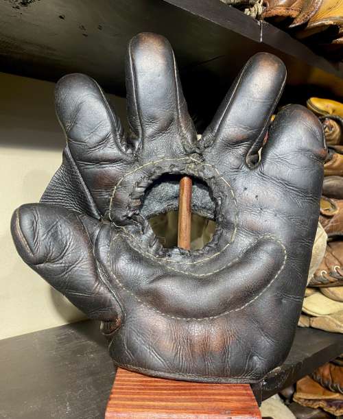 Early 1900's Hole in Palm Crescent Glove Front