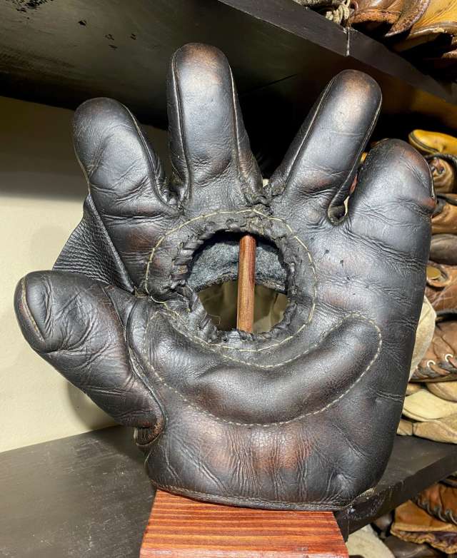 Early 1900's Hole in Palm Crescent Glove Front