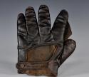 View the image: Early 1900's Spalding Black Crescent Glove Back