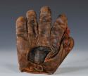View the image: Early 1900's Victor Buckle Web Crescent Glove Back
