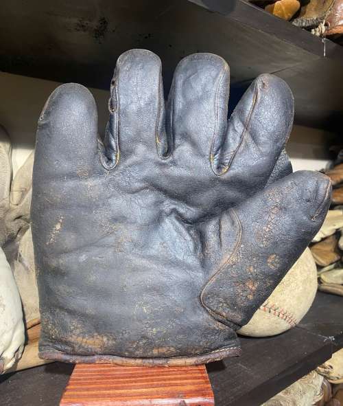 A J Reach 10N 1 Inch Web Lefty Front Aaron