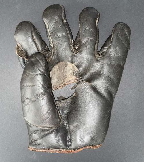 Spalding Hole in Palm Front