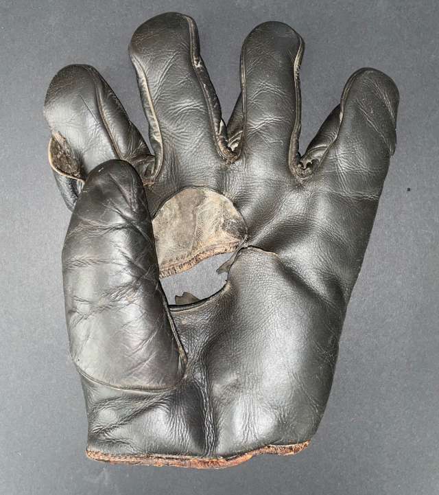 Spalding Hole in Palm Front